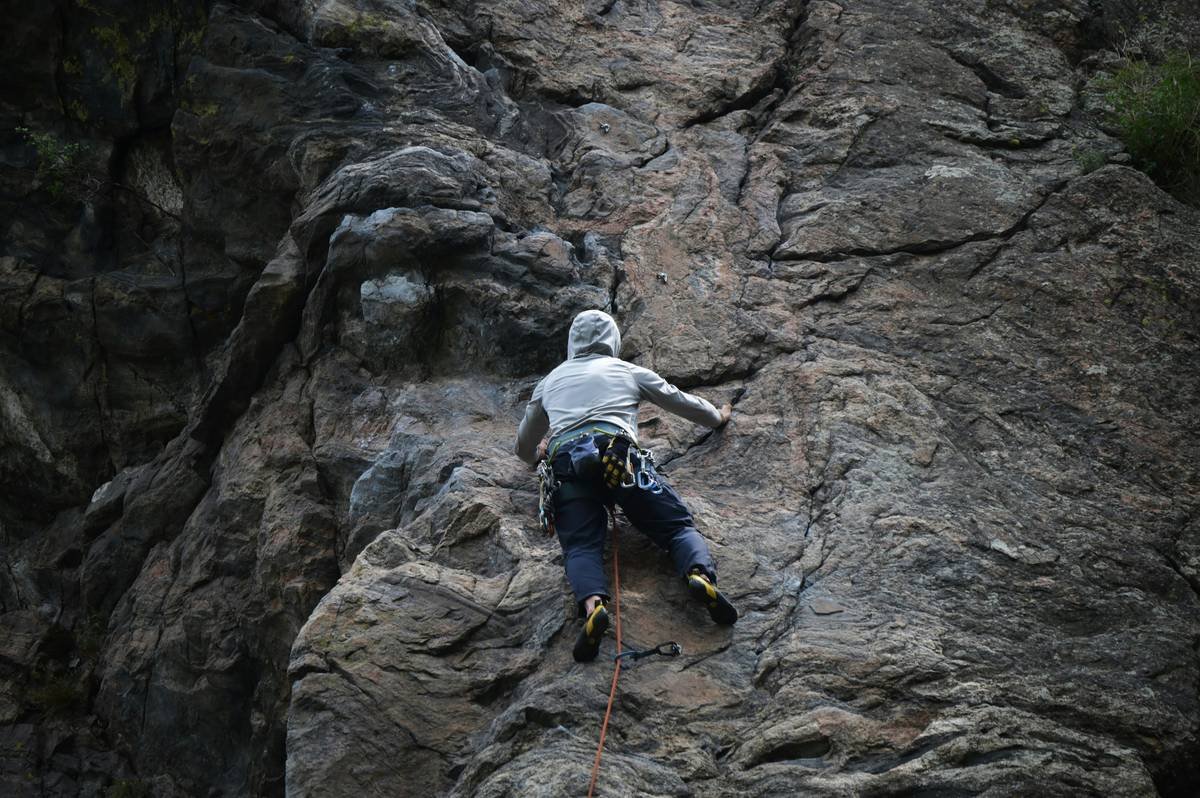 rock climbing anchor systems with cordelette and locking carabiners on bolted anchors